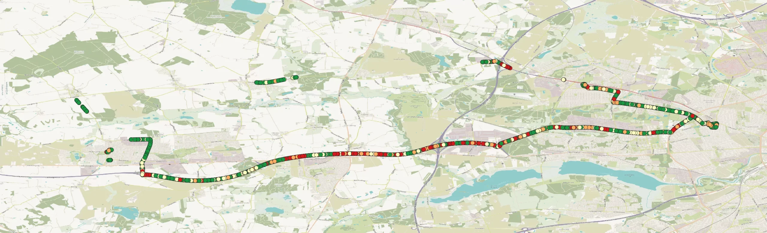 Map of a driven route with litter detections marked as coloured points from green to red